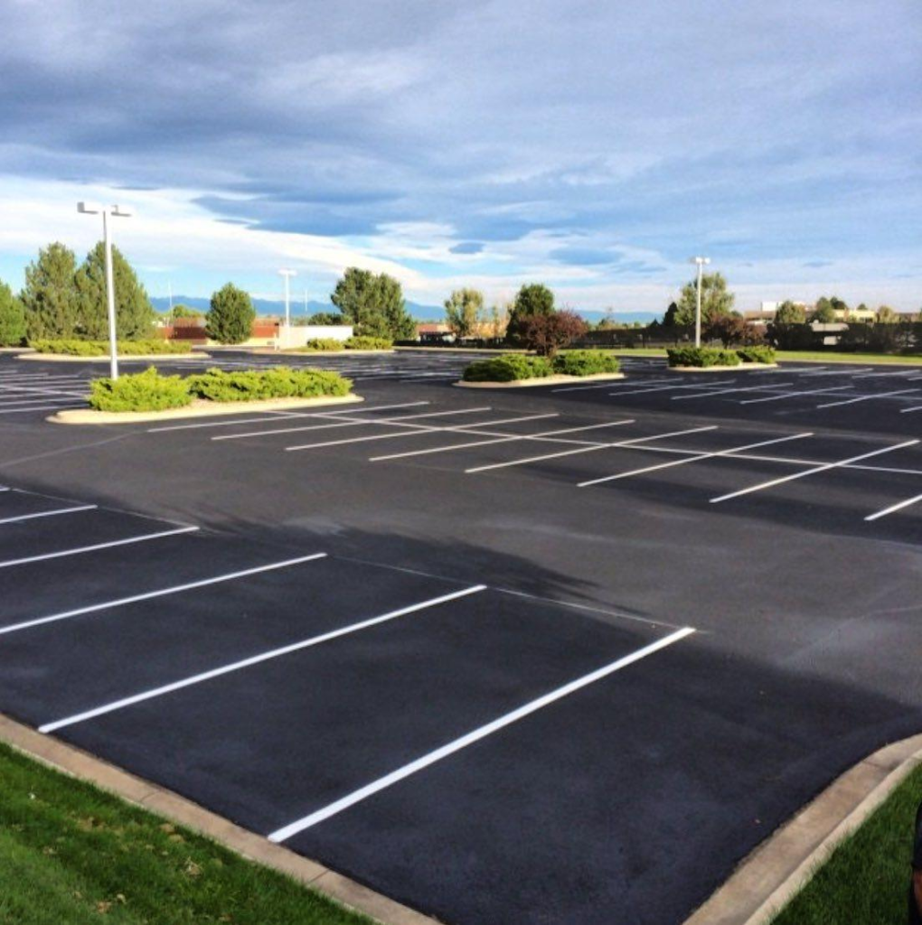 Finished commercial asphalt parking lot with fresh striping